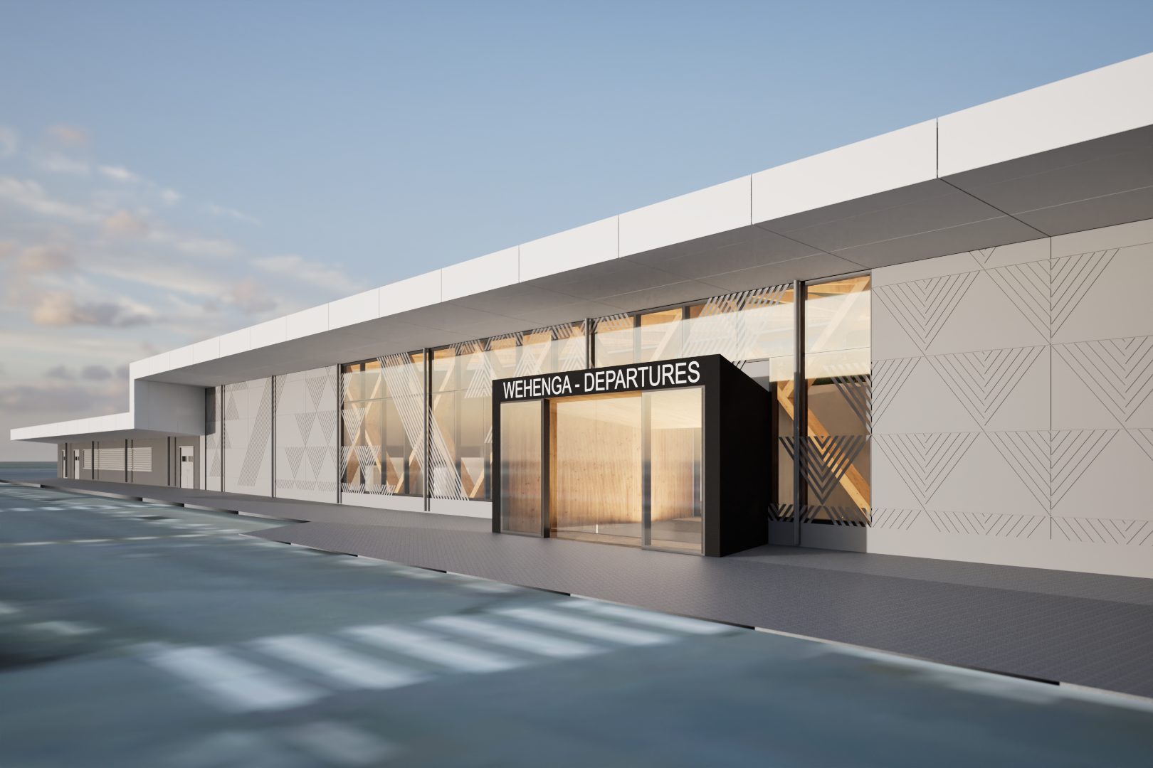 The terminal’s entry experience features layered façade detailing and bilingual signage, offering a calm and culturally grounded welcome for departing travellers.